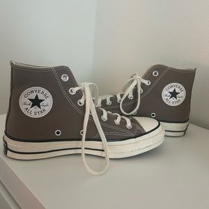 Light brown high top converse
